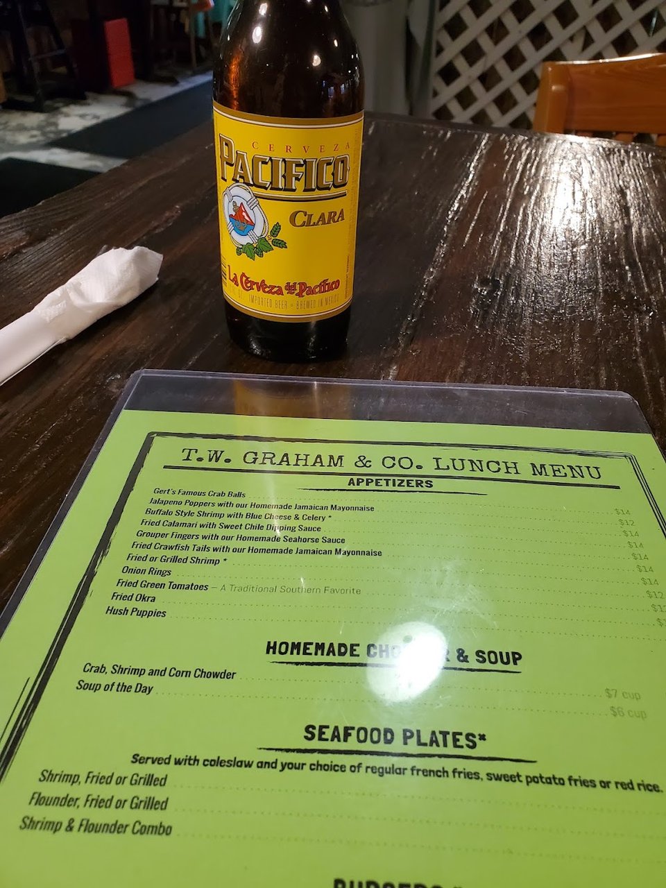 Close-up of appetizers and seafood plate choices.